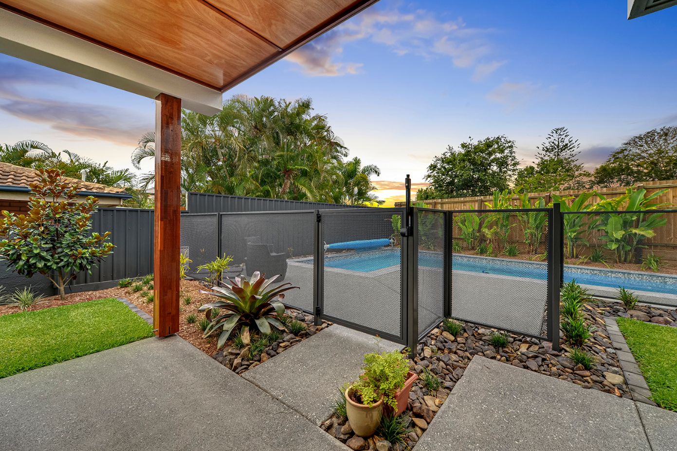 Pure Perf pool fencing with gate in Textured Monument, Queensland